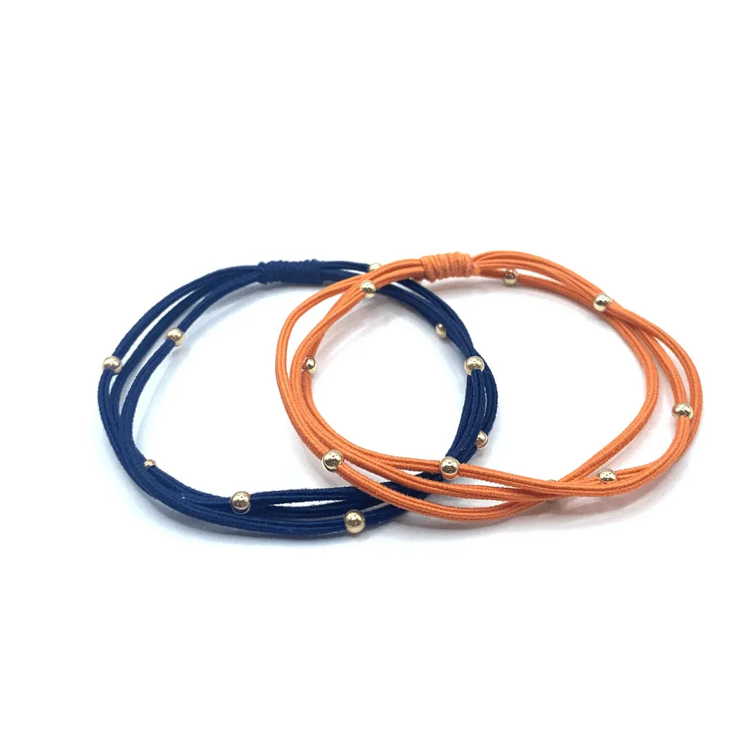 3MM GOLD WATER PONY WATERPROOF BRACELET HAIR BANDS IN ORANGE AND NAVY